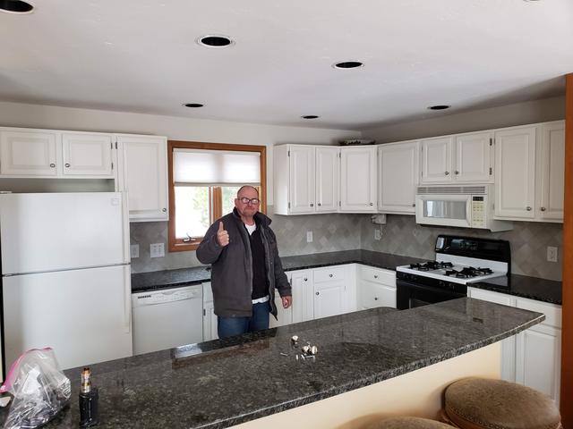 Thumbs up on a finished kitchen by Jewell Painting