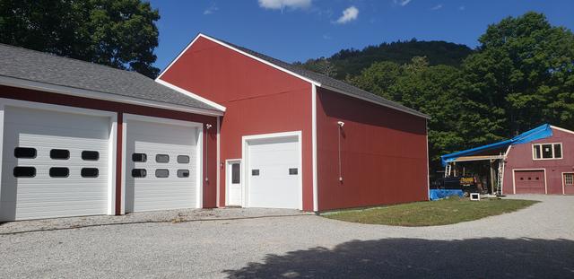 Barn-red garage and outbuilding by Jewell Painting